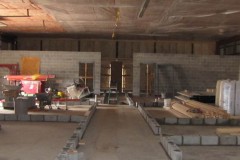 Masonry going up for the kennel pods.  A review of the plans with the Cornell Shelter Management Program suggested that we needed one more wall to keep the dogs isolated at four kennels per pod.  Thanks to Professor Jan Scarlett for insisting on the Jan Scarlett Wall.